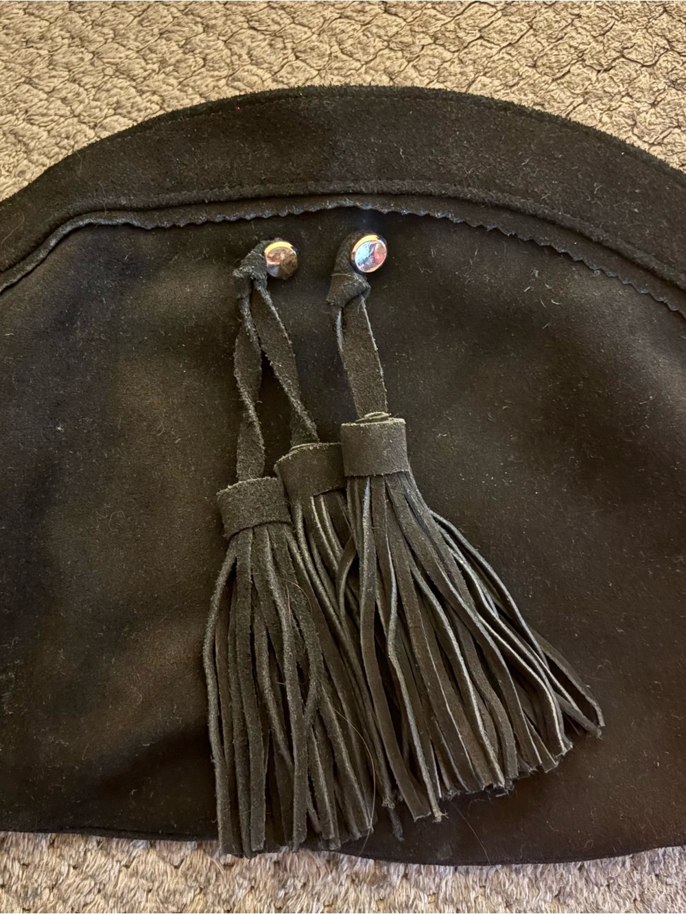 Leather clutch with tassel